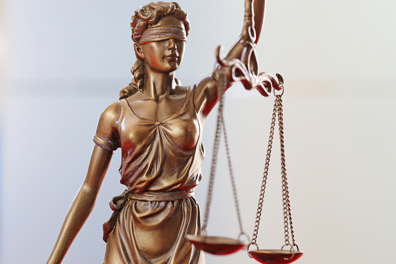 Nahaufnahme einer Justitia als Symbolbild für Recht, Gerechtigk